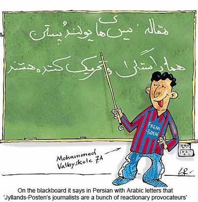 Mohammed points to a chalkboard that says, We're a bunch of provocateurs (from the Jyllands Posten newspaper)