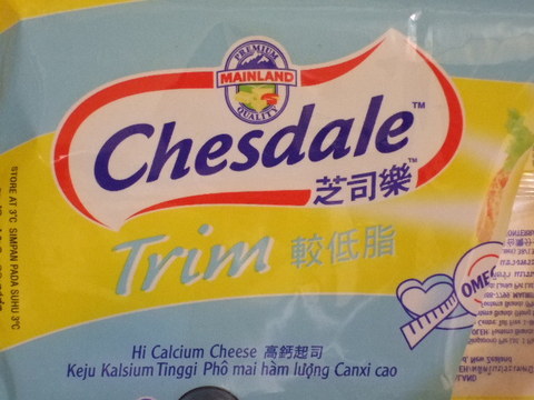 Package of sliced cheese in Taiwan. The package declares the cheese has Premium Mainland Quality. (Cheese is actually from New Zealand).