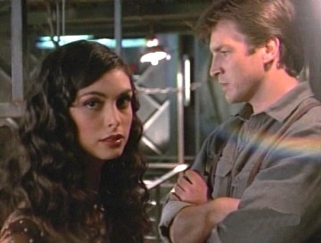 Captain Malcolm Reynolds and Inara aboard the Serenity. From Firefly.