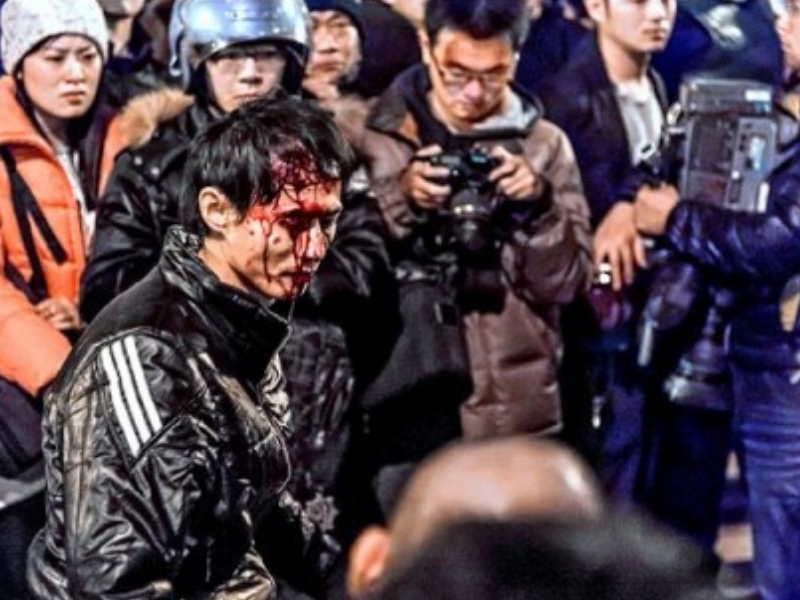Student with bloody head after being beaten by police truncheons during Ma Ying-jeou's bloody crackdown on students at Taiwan's Executive Yuan.
