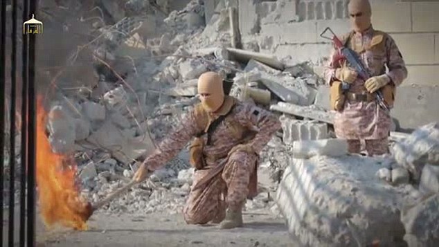 ISIS Islamofascists set fire to gas trail leading to cage holding Jordanian pilot Lieutenant Moaz al-Kasasbeh.