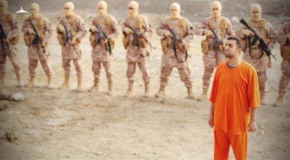 Jordanian pilot Lieutenant Moaz al-Kasasbeh being led to cage before being doused in gasoline and burned alive by ISIS.