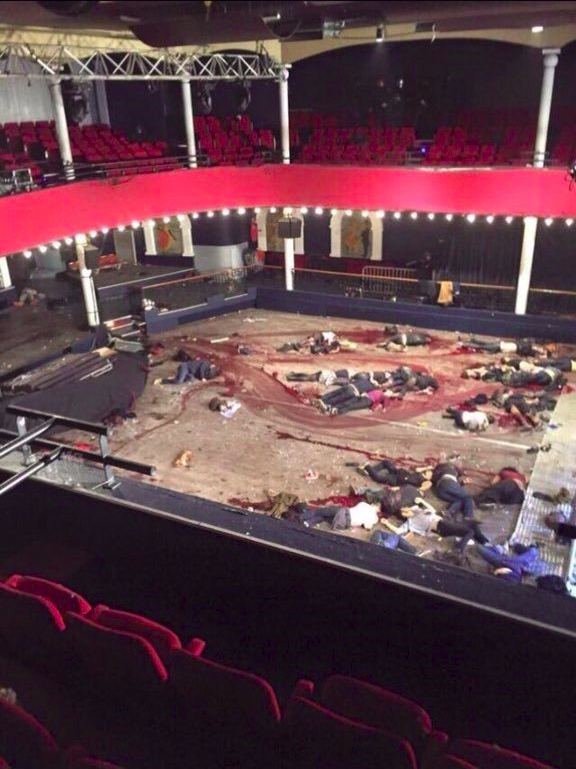 Bloody Muslim death squad victims lying in center of Bataclan theater after November 13, 2015 Paris Attack.