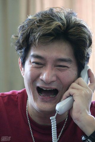 Chinese Communist Party quisling Huang An on telephone